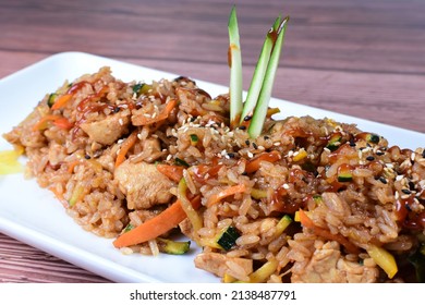 Sauteed Wok Rice, Accompanied By Beef Tenderloin, Vegetables, Chicken, Sesame, Soy Sauce And Teriyaki