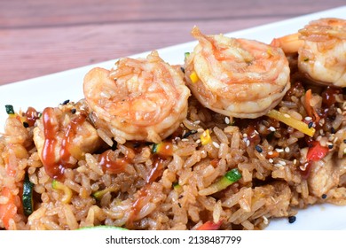 Sauteed Wok Rice, Accompanied By Beef Tenderloin, Vegetables, Chicken, Sesame, Soy Sauce And Teriyaki