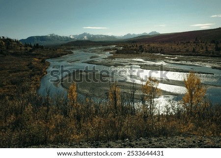 Similar – Image, Stock Photo Alaska | Denali National Park | River course in majestic expanse and first snow on the mountains