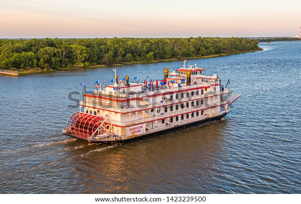 SAVANNAH, GEORGIA - April 29, 2019: Savannah is\
the oldest city in Georgia. From the historic architecture and\
parks to cruises on the river, Savannah attracts millions of\
visitors annually.