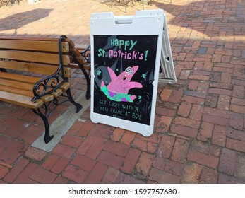 Savannah, Georgia, United States - Feb 17, 2017: Patrick Star drawing on sign in town next to bench