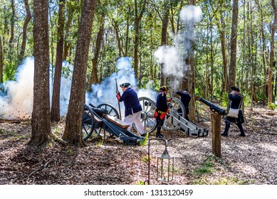 SAVANNAH GEORGIA, UNITED STATES - February 10, 2019: American Militia Firing Cannon In Savannah Georgia At A Colonial Faire