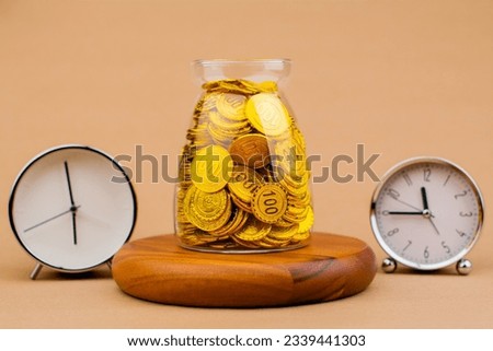 Save gold in a glass jar with precious time. Real estate and valuables Gold coins World gold market Gold stocks Invest 