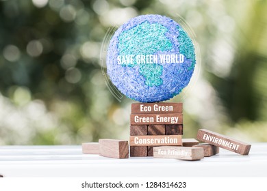 Save Green World Or Earth Day Concept. Paper Mache Craft Earth Globe With Radar On Wooden Block For Letter E.g Eco Green, Green Energy,sustainable, Eco Friendly, Environment On Nature Background