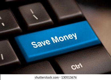 Save Money For Investment Concept With A Blue Button On Computer Keyboard