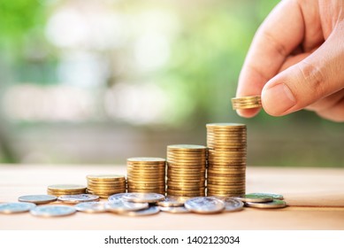 Save money with stack coin for growing your business , money investment concept. - Shutterstock ID 1402123034
