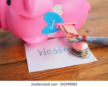 Save money for wedding with piggy bank concept. - Shutterstock ID 592998983