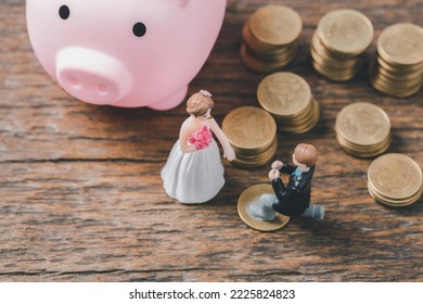 Save money for wedding and planning wedding concept. Sustainable financial goal for family life or married life. Miniature wedding on rows of rising coins, depicts savings or growth for new family. - Powered by Shutterstock