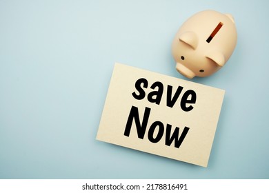 Save Now Text Message And Piggy Bank On Blue Background