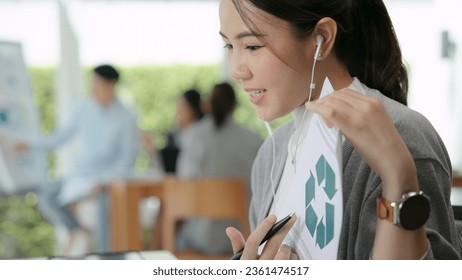 Save the planet earth of Future growth Net zero waste ESG office SME global protect CO2 emission social issues project. Young woman asia people teaching advice Eco friendly SDGs job on laptop seminar. - Powered by Shutterstock