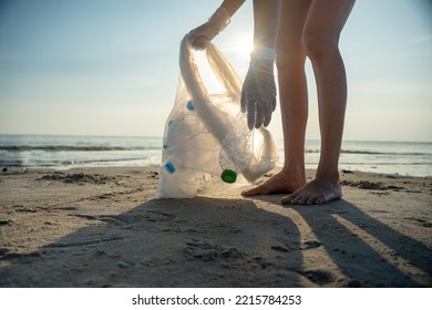 Save Water. Volunteer Pick Up Trash Garbage At The Beach And Plastic Bottles Are Difficult Decompose Prevent Harm Aquatic Life. Earth, Environment, Greening Planet, Reduce Global Warming, Save World