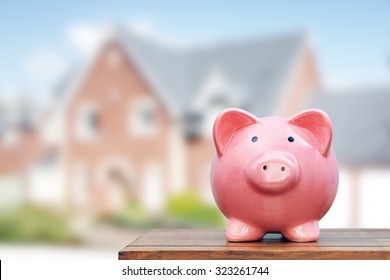 Saving To Buy A House, Real Estate Or Home Savings, Piggy Bank In Front Of Property