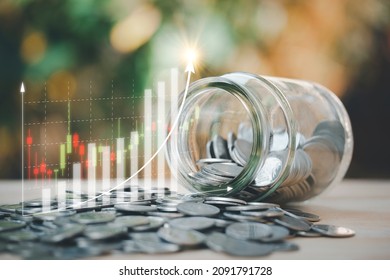 Saving concept, a glass jar with coins inside and a lot of coins for financial and business background, keep money for education, learning, funds, bonds, dividends, investments in future.