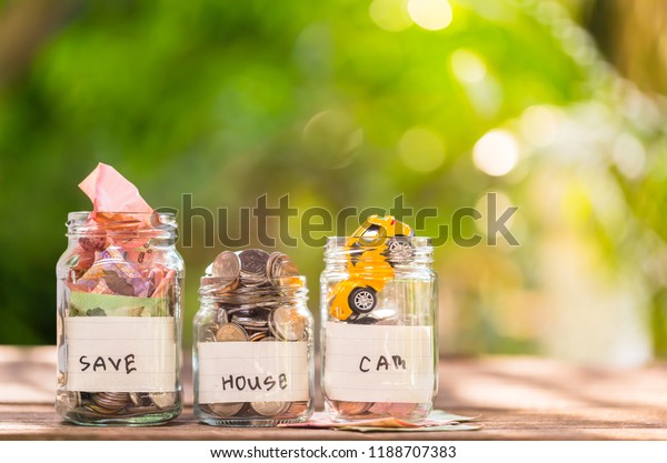 Saving money in a bottle, having a full glass\
of money / saving for the future / Investing with savings to buy a\
home, car, education