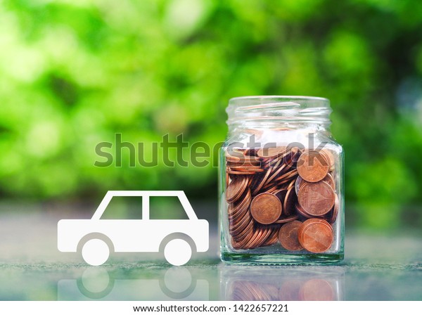 Saving money for car. insurance, loan, finance and\
buying car concept. 