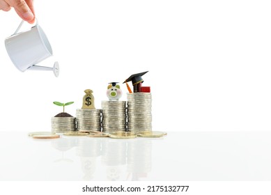 Saving Money For College Tuition Fee Concept : Hand Pours Water From Watering Can, Sprout Or A Small Tree, US Dollar Bag, Piggybank, Book And Black Grad Cap On Coins, Isolated On White Background.