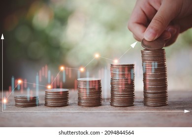 Saving money, educational, investment and financial concept for Stacking coins with hand of child putting money on top, growth for the future. Funds, Bonds, Dividends and Interest.