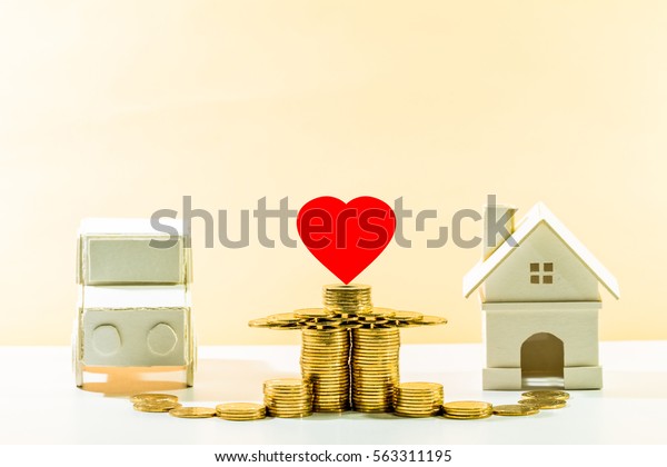 Saving money for real estate to\
buying a new home and car or loan for family with love\
concept.
