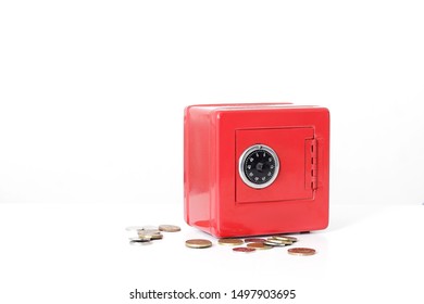 Saving Money In A Red Money Box With Stack Of Coins White Background No People Stock Image And Stock Photo