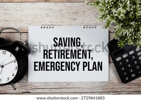 Saving, Retirement, Emergency Plan text with alarm clock and calculator on wooden background