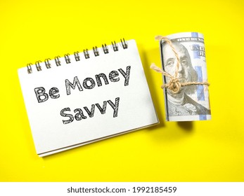Savings concept,Text Be money savvy on yellow background. - Shutterstock ID 1992185459