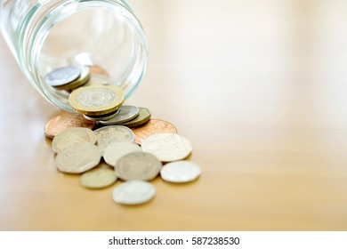 Savings Jar And British Coins