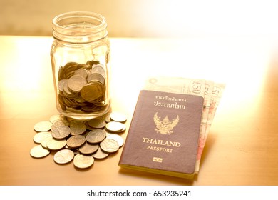 Savings Jar With Currency For Travel 