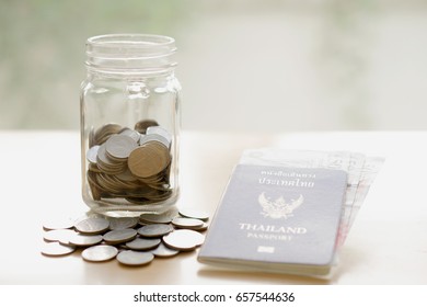 Savings Jar With Currency For Travel