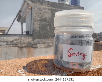 savings jar isolated with beautiful nature 