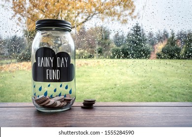 Savings For A Rainy Day Fund Glass Jar With Money