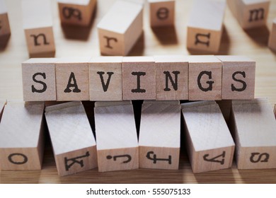 Savings Word In Wooden Cube
