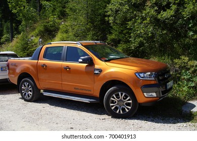 Savinjska, Slovenia - August 4, 2017: Orange Ford Ranger (codenamed T6) Wildtrack Parked By The Side Of The Road. Nobody In The Vehicle.