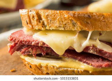 Savory Homemade Corned Beef Reuben Sandwich with Mustard and Cheese