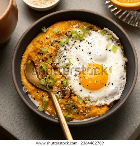 Savory Sesame Carrot Oatmeal with spoon
