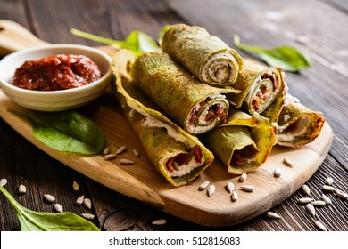 Savory Spinach Pancakes Stuffed With Feta Cheese, Curd, Sun Dried Tomato And Sunflower Seeds