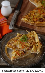 Savoury vegetable tart pie with cabbage, bacon and carrots - Shutterstock ID 2267732071