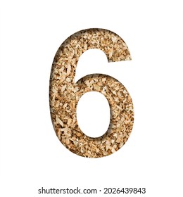 Sawdust Wood Font. Digit Six, 6 Cut Out Of Paper On The Background Of Sawdust Or Small Shavings Of A Fruit Tree. Decorative Alphabet For Handmade Or Small Production, Font Collection.