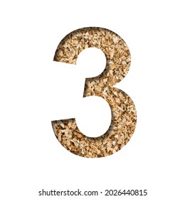 Sawdust Wood Font. Digit Three, 3 Cut Out Of Paper On The Background Of Sawdust Or Small Shavings Of A Fruit Tree. Decorative Alphabet For Handmade Or Small Production, Font Collection.