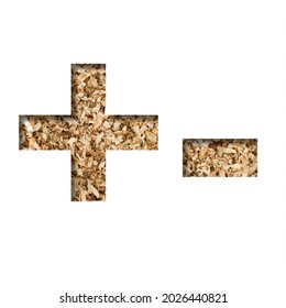 Sawdust Wood Font. Plus And Minus Signs Cut Out Of Paper On The Background Of Sawdust Or Small Shavings Of A Fruit Tree. Decorative Alphabet For Handmade Or Small Production, Font Collection.