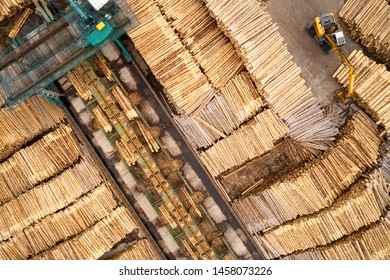 Sawmill Aerial View Chopped Tree Wood Logs Stacks In A Row With Machinery