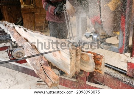 Sawmill. The process of processing wooden boards at a sawmill. Timber industry