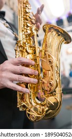 Saxophone, close-up. The musician plays the saxophone.	 - Shutterstock ID 1895040526