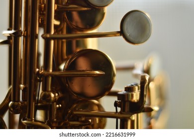 Saxophone detail. Macro image of the valves and keys of a saxophone.