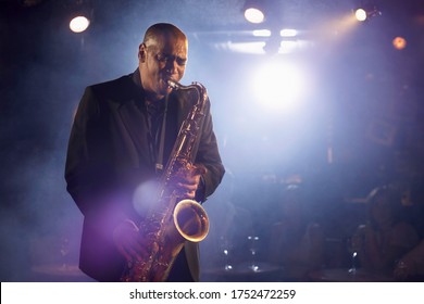 Saxophone player on stage portrait