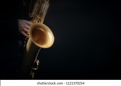 Saxophone Player. Saxophonist Playing Jazz Music. Baritone Sax 