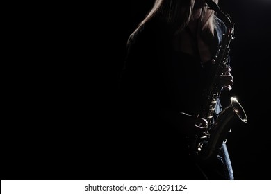 Saxophone Player Saxophonist playing jazz music. Sax alto Jazz Musician hands closeup