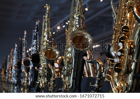 Saxophones to sell in a shop