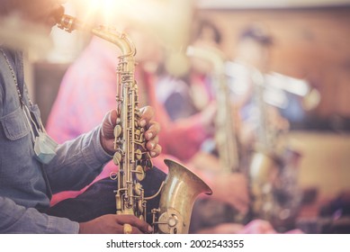 Saxophonist Playing Jazz Alto Sax Instrument