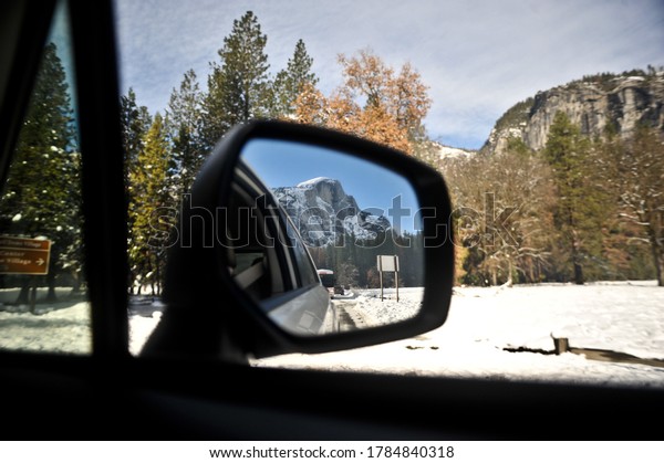 Saying goodbye to Half Dome in Yosemite through my\
rearview mirror. 
