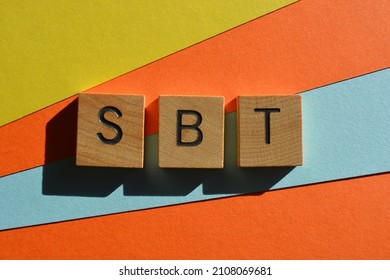 SBT, Acronym For Science Based Targets In Wooden Alphabet Letters Isolated On Multicolored Background